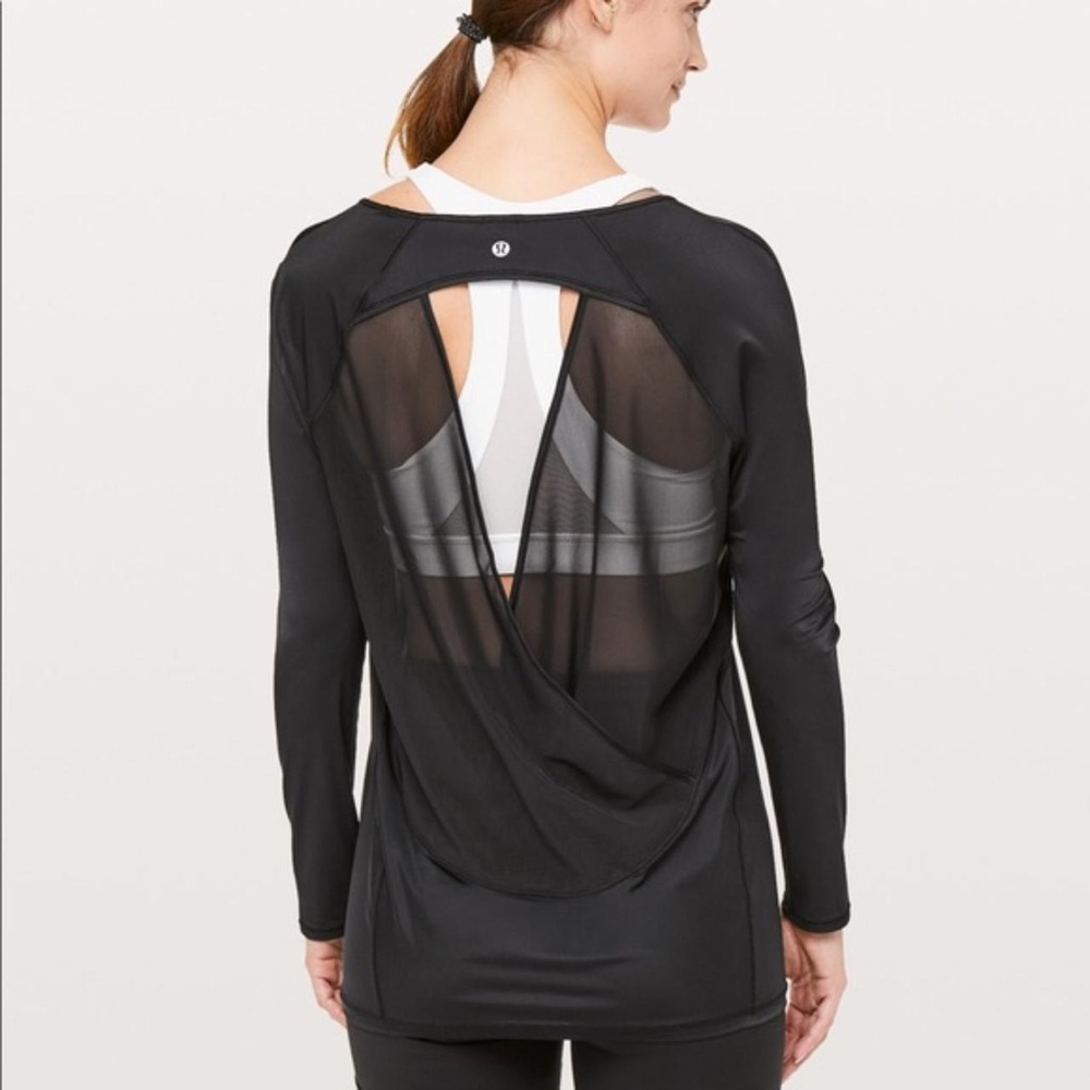 Lulu Lemon black If Your Lucky top
No tags, size large 
Great condition